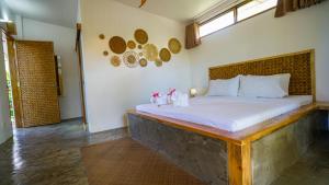 Voodi või voodid majutusasutuse Serenity Hotel toas