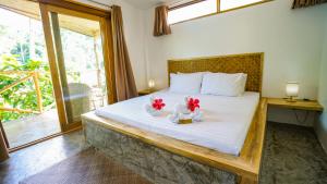 Voodi või voodid majutusasutuse Serenity Hotel toas
