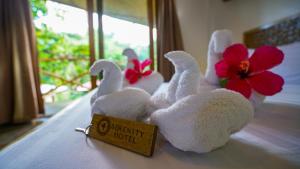 Voodi või voodid majutusasutuse Serenity Hotel toas