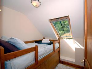 Postel nebo postele na pokoji v ubytování The Hayloft