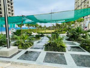 En hage utenfor ALanKrita Homes