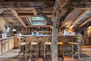 Lounge nebo bar v ubytování Résidence Arielle - Chalets pour 14 Personnes 534