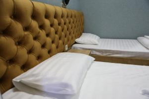 Ένα ή περισσότερα κρεβάτια σε δωμάτιο στο Luxor Rabath