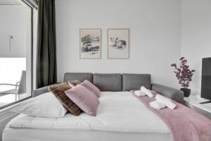 Postel nebo postele na pokoji v ubytování Bellarova Apartments IX