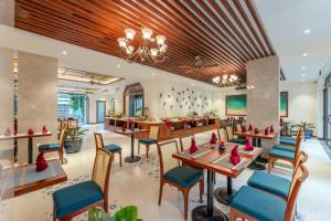 Restaurant o un lloc per menjar a Amina Lantana Hoi An Hotel & Spa