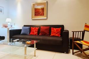 Zona de estar de Unobstructred seaviews, 2BR, Kingbeds, Fully ACd