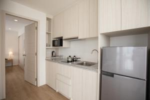 Kuchyň nebo kuchyňský kout v ubytování Kantary Hotel Banchang