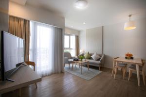 TV a/nebo společenská místnost v ubytování Kantary Hotel Banchang
