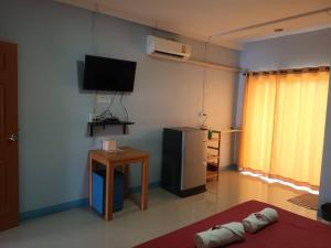 TV a/nebo společenská místnost v ubytování Center Place Ang Thong