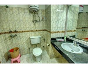 Ванна кімната в Khushboo Resorts, Manali