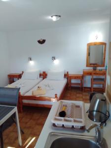 Fotografia z galérie ubytovania Samos Rooms v destinácii Pythagoreio + 9 fotografií