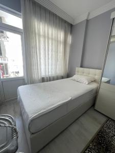 Postel nebo postele na pokoji v ubytování Blue Apartments City Centre