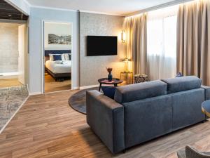 Postel nebo postele na pokoji v ubytování Mercure Toulouse Aeroport Blagnac
