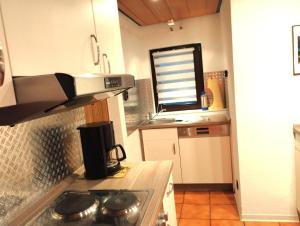 Η κουζίνα ή μικρή κουζίνα στο Ferienwohnung Jette +15 φωτογραφίες