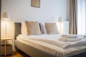 Posteľ alebo postele v izbe v ubytovaní Venus Apartments - Synagogue I