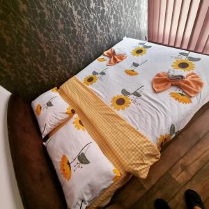 Łóżko lub łóżka w pokoju w obiekcie Apartman Ruzmići Divčibare