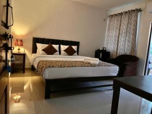 Кровать или кровати в номере Sea 2000 Resort