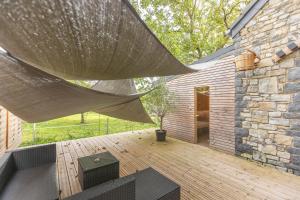 Fotografie z fotogalerie ubytování L'Antre d'Eux - Suite avec sauna et jacuzzi v destinaci Senenne