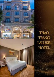 een hotelkamer met een bed en een gebouw bij Thao Trang Laluxe Hotel Phu My Hung in Ho Chi Minh-stad