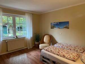 Postel nebo postele na pokoji v ubytování Ferienwohnung im Landhaus