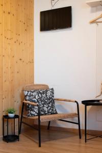 TV a/nebo společenská místnost v ubytování Motel-Restaurant 13 Etoiles