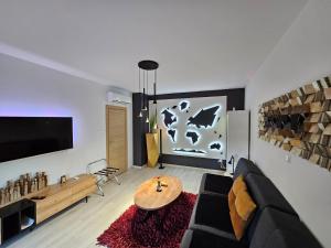 Телевизия и/или развлекателен център в Apartment SAND - Entry with PIN 0 - 24h, Luxury massage chair FREE CANCELLATION UNTIL 2 PM ON THE LAST DAY OF CHECK IN