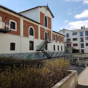 an external view of a building with a staircase at Royal Place 2 bedrooms Apartment Wilanów in Warsaw