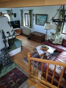 a living room with a couch and a table at Die Hube in Leutschach