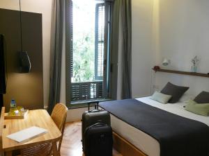 Posteľ alebo postele v izbe v ubytovaní Casa Mathilda