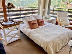Ліжко або ліжка в номері Appartement lumineux & central