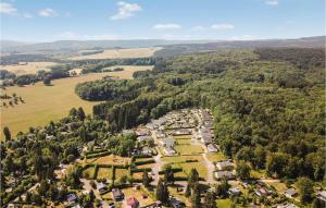 una vista aérea de un pueblo en un bosque en Lovely Home In Gerolstein-hinterhaus, With Kitchen, en Hinterhausen