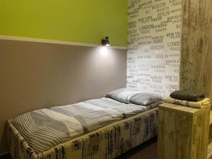 Postel nebo postele na pokoji v ubytování Hotel Herman