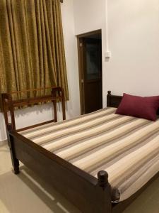 Ένα ή περισσότερα κρεβάτια σε δωμάτιο στο The Paramount Lodge
