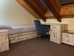 Postel nebo postele na pokoji v ubytování Hotel Herman