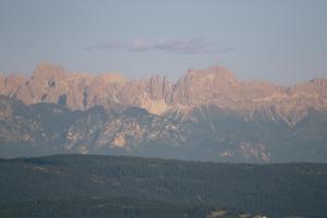 a view of a mountain range with trees and mountains at Vigilius Mountain Resort in Lana +90 photos