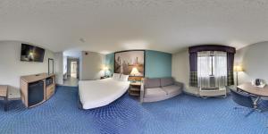 Posezení v ubytování Super 8 by Wyndham Rockford I-90 Casino District