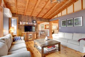 a living room with white couches and a wooden ceiling at Weston Vacation Rental - Close to Ski Resorts! in Weston