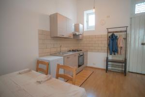 Kuchyň nebo kuchyňský kout v ubytování Nonno Orazio + 27 fotografií