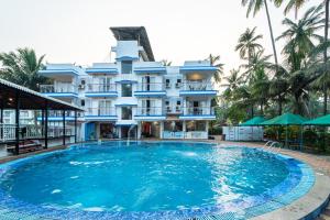 Bazén v ubytování Treebo Gulmohar Beach Resort nebo v jeho okolí