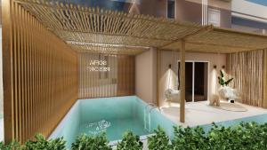 a rendering of a swimming pool in a building at Sofia Resort Luxury Suites in Georgioupolis