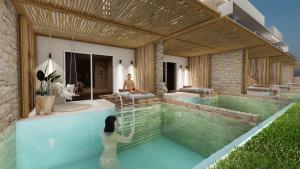 een weergave van een villa met zwembad bij Sofia Resort Luxury Suites in Georgioupolis