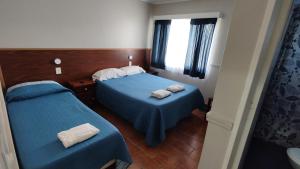 Postel nebo postele na pokoji v ubytování Laguna Azul