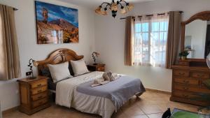 Postel nebo postele na pokoji v ubytování MaraVillas de Tenerife II