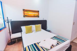 Letto o letti in una camera di Hotel Guatatur