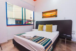 Letto o letti in una camera di Hotel Guatatur