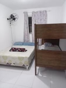 En eller flere senge i et værelse på Casa Carapibus Ale + 17 billeder