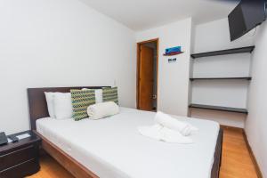 Letto o letti in una camera di Hotel Guatatur