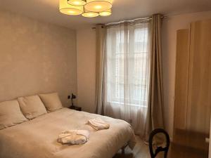 Łóżko lub łóżka w pokoju w obiekcie Bella Vita