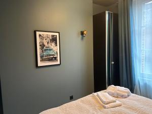 Łóżko lub łóżka w pokoju w obiekcie Bella Vita