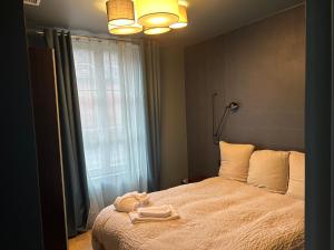 Łóżko lub łóżka w pokoju w obiekcie Bella Vita